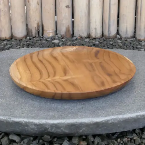Product image of the product “Wooden plate, made of teak wood, 25 cm dia. ”